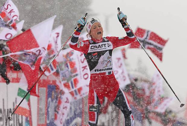 La norvegese Therese Johaug trionfa al Tour de Ski 2014 (foto Newspower)